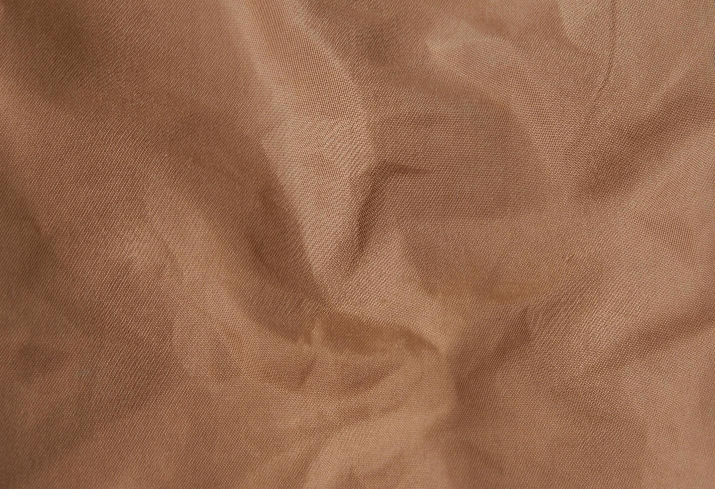 Close up of brown cloth texture background photo