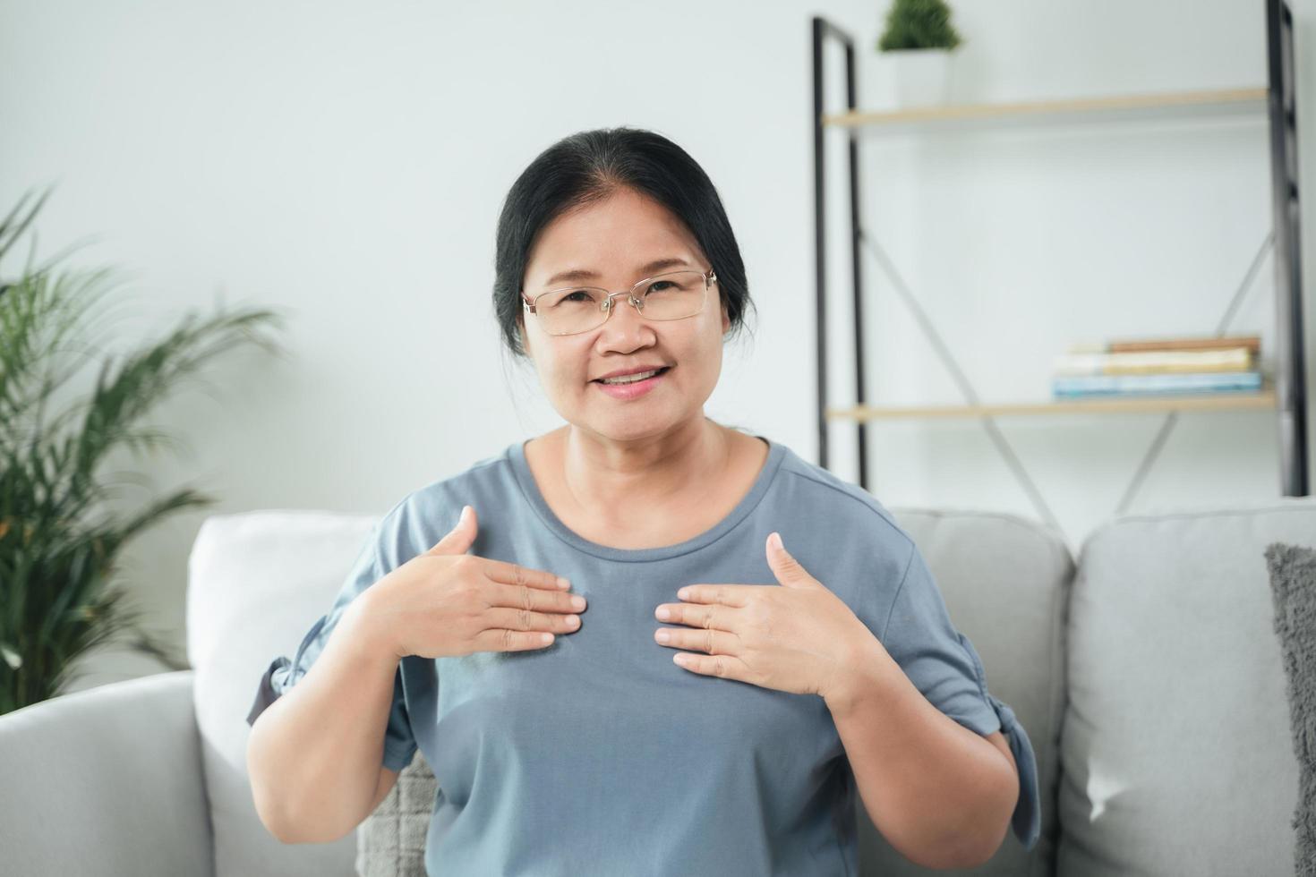 Deaf disable woman use Sign Language to communicate with other people. photo