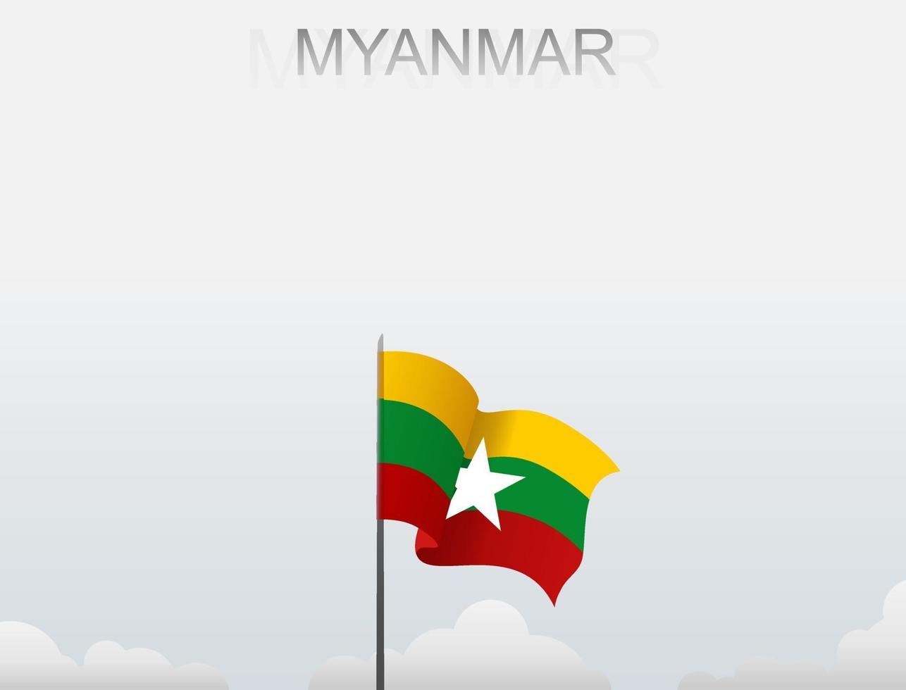 Flag of Myanmar flying under the white sky vector