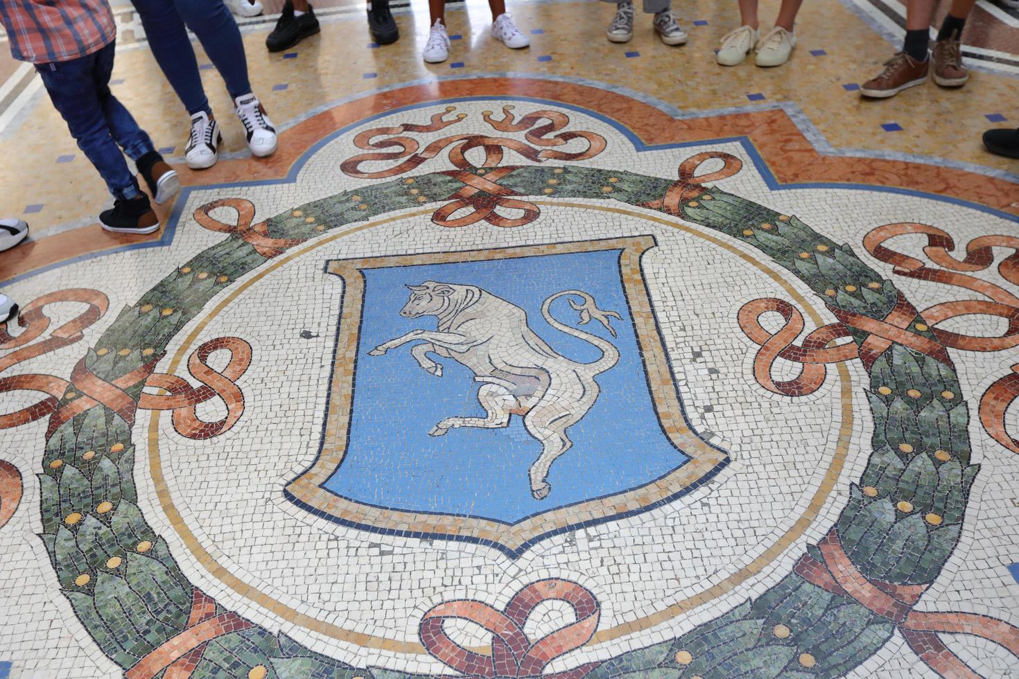 Mosaic of a bull in Galleria Vittorio Emanuele II, Milan photo