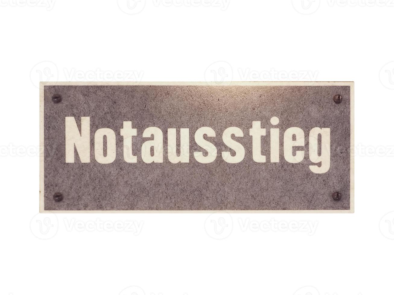 signo alemán aislado sobre blanco. salida de emergencia notausstieg foto