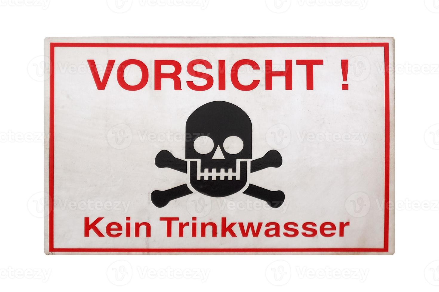 German sign isolated over white. Attention, no drinking water. photo