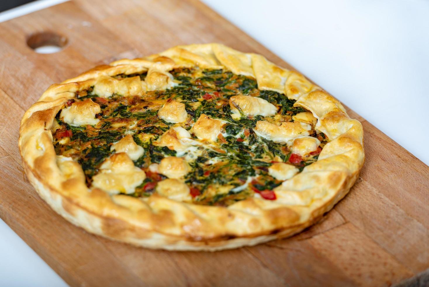 Vegetable Tart, puff pastry, chard, carrot, onion, garlic and red. photo