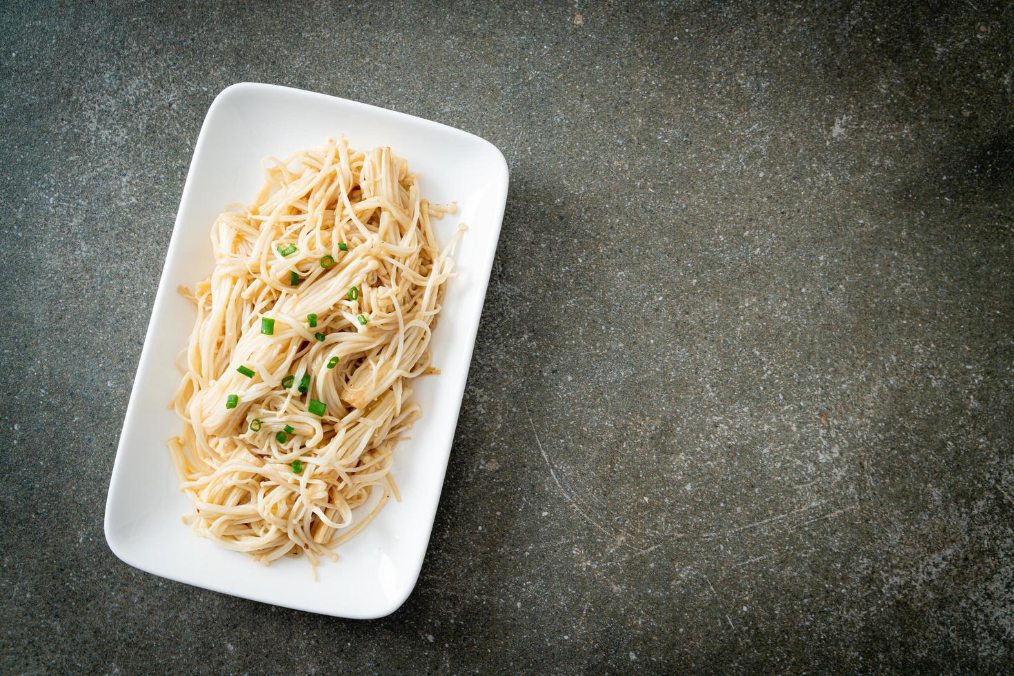 Stir-fried golden needle mushroom with butter photo