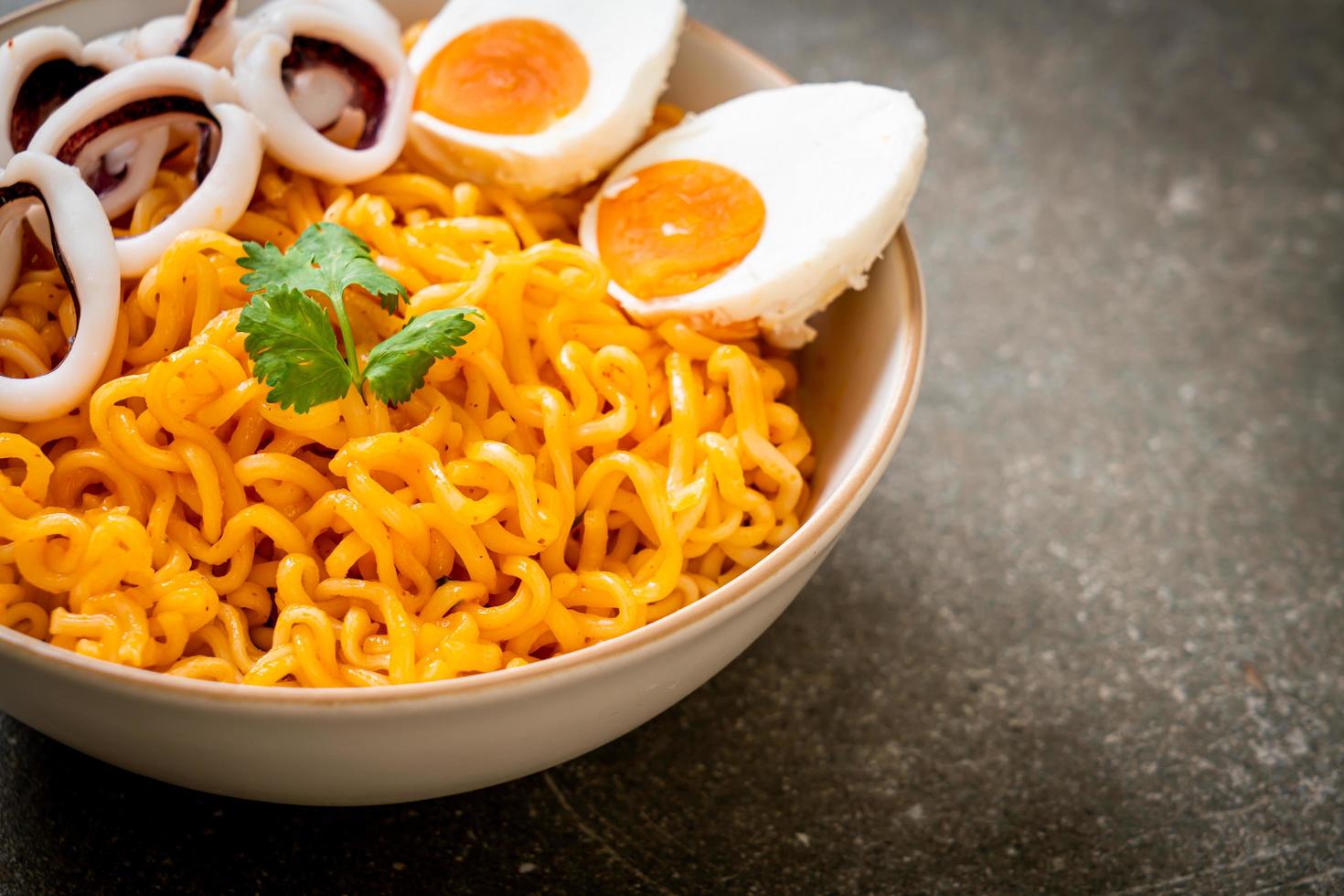 Instant noodles salt egg flavour with squid or octopus photo