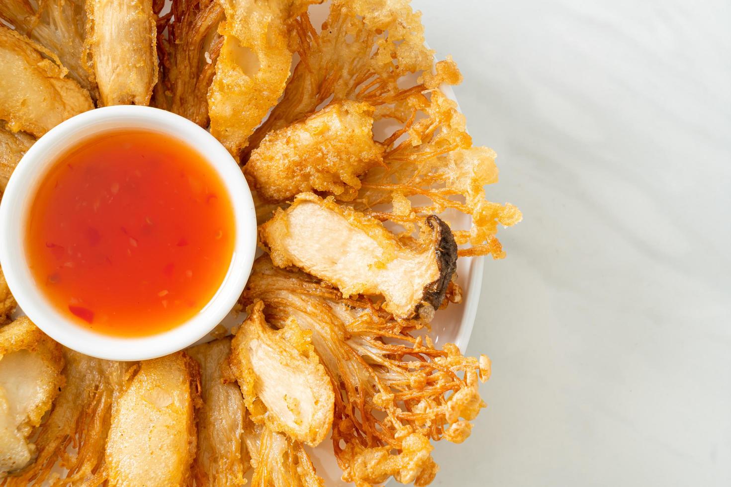 Fried Enoki mushroom and King Oyster mushroom with spicy dipping sauce photo