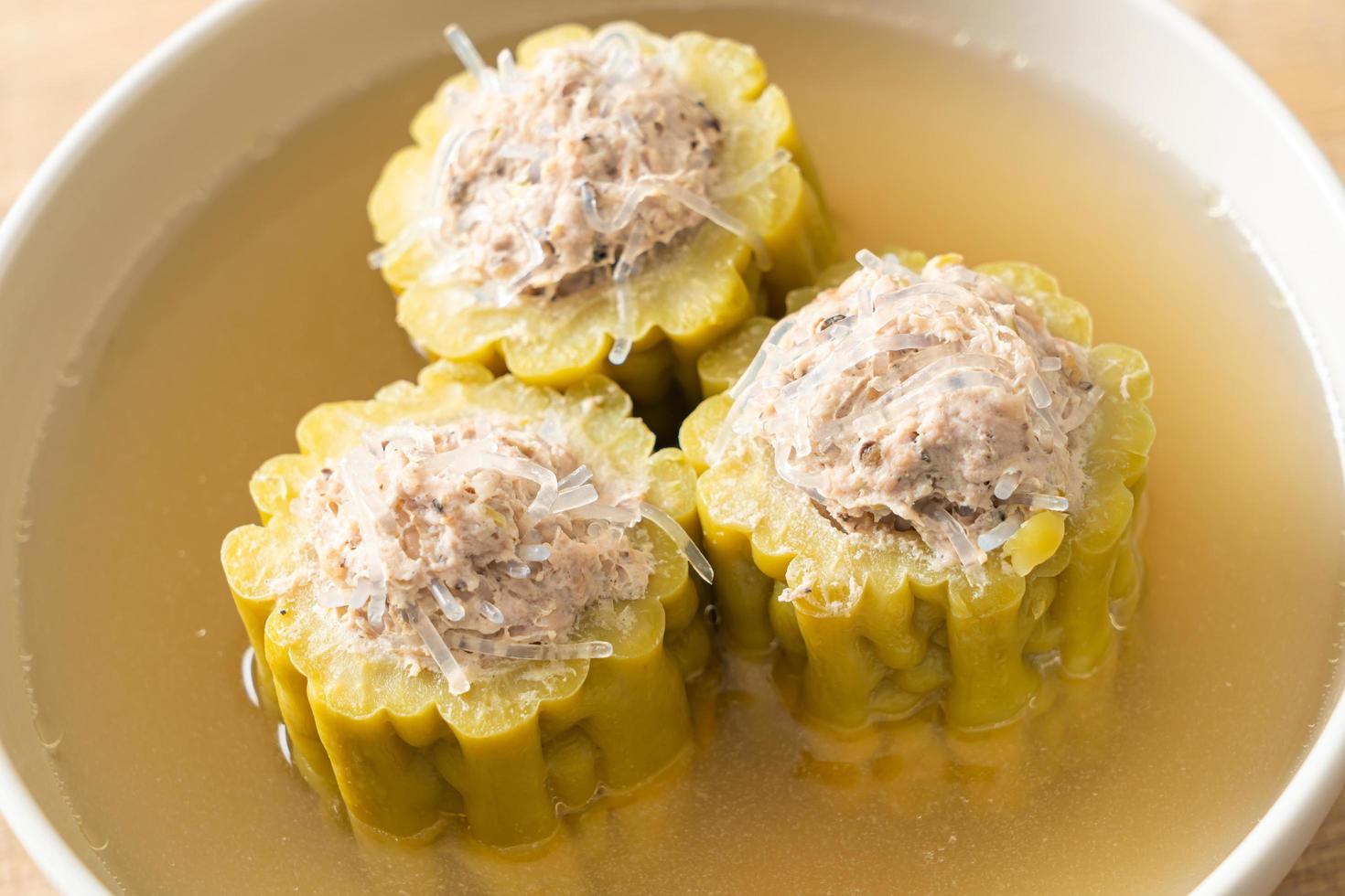 Stuffed bitter gourd with seasoned minced pork soup photo