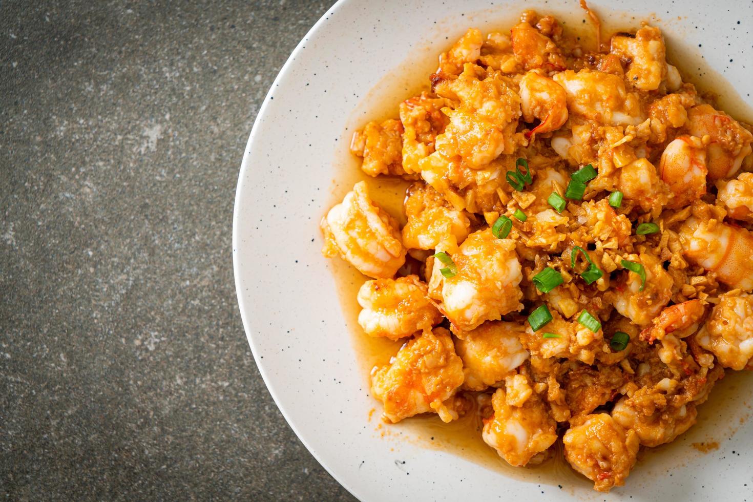 Stir-fried shrimps with garlic and shrimps paste photo