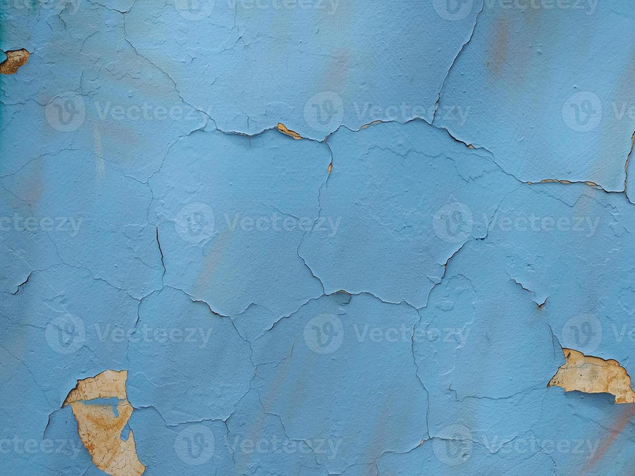 Grunge blue plaster wall background photo