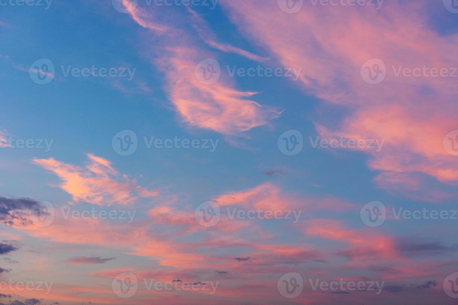 Real majestic sunrise sundown sky background with gentle clouds photo
