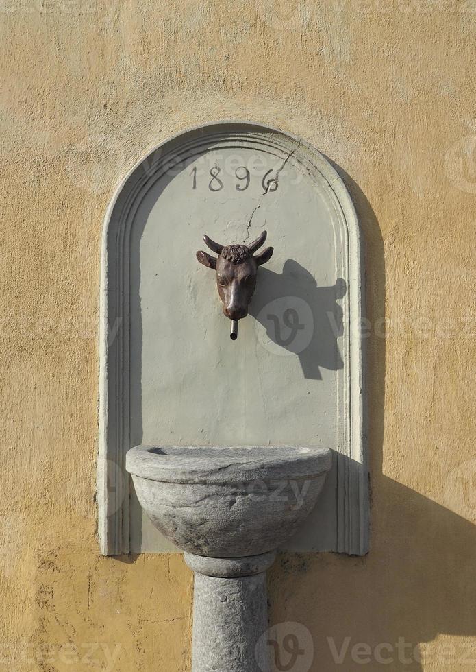 Ancient water fountain or bubbler photo