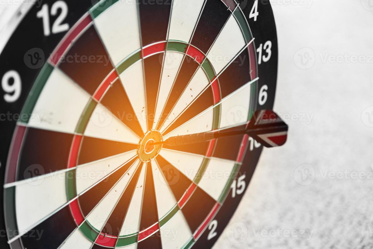 Dart board and arrow in middle. Business and success concept photo