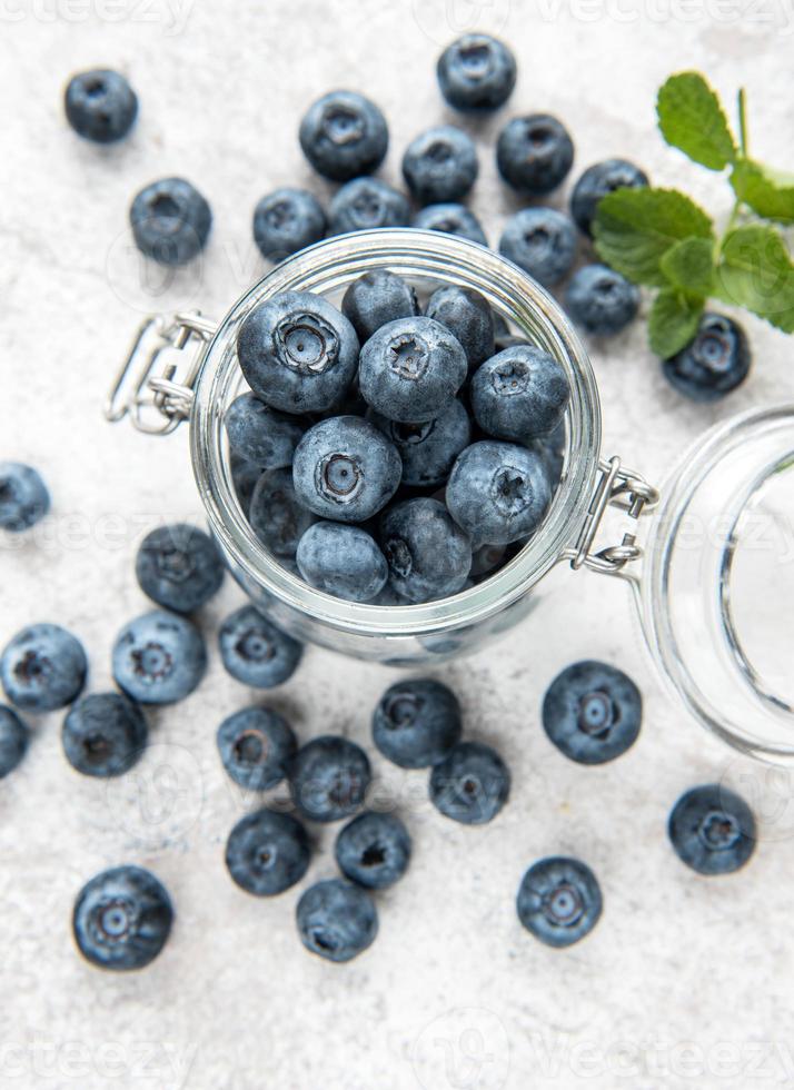 Blueberries on concrete background photo