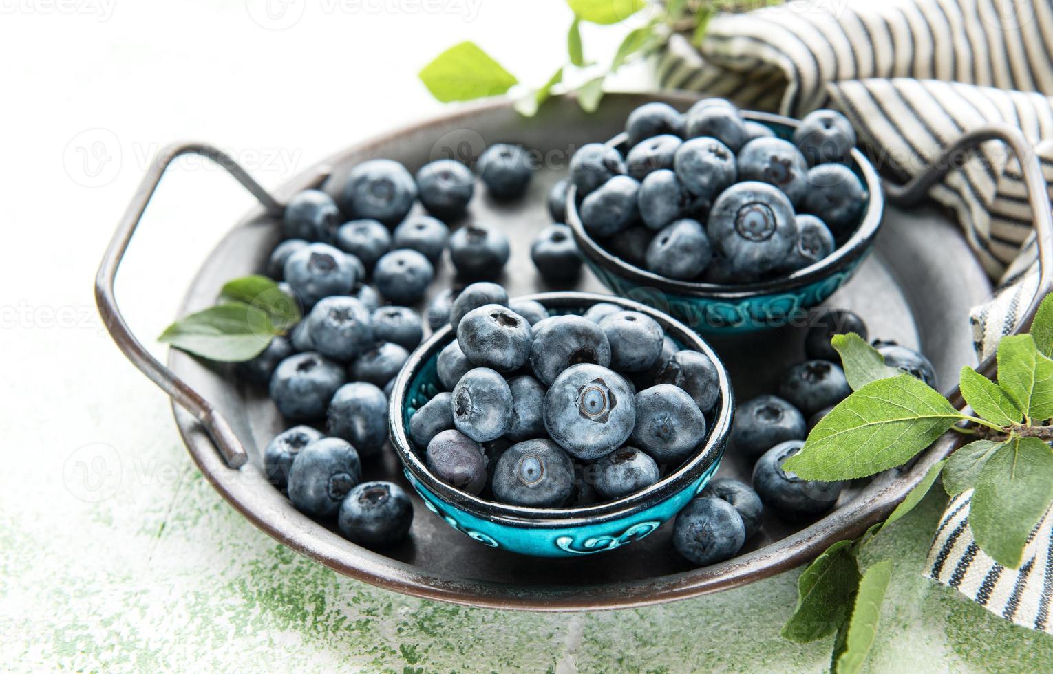 Blueberries on wooden background photo