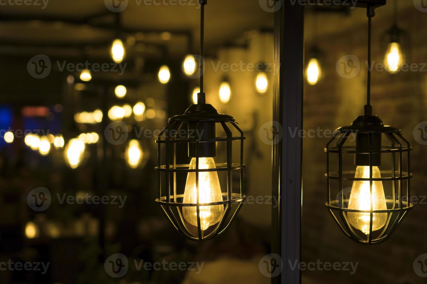 Retro style lamps in a restaurant or cafe photo