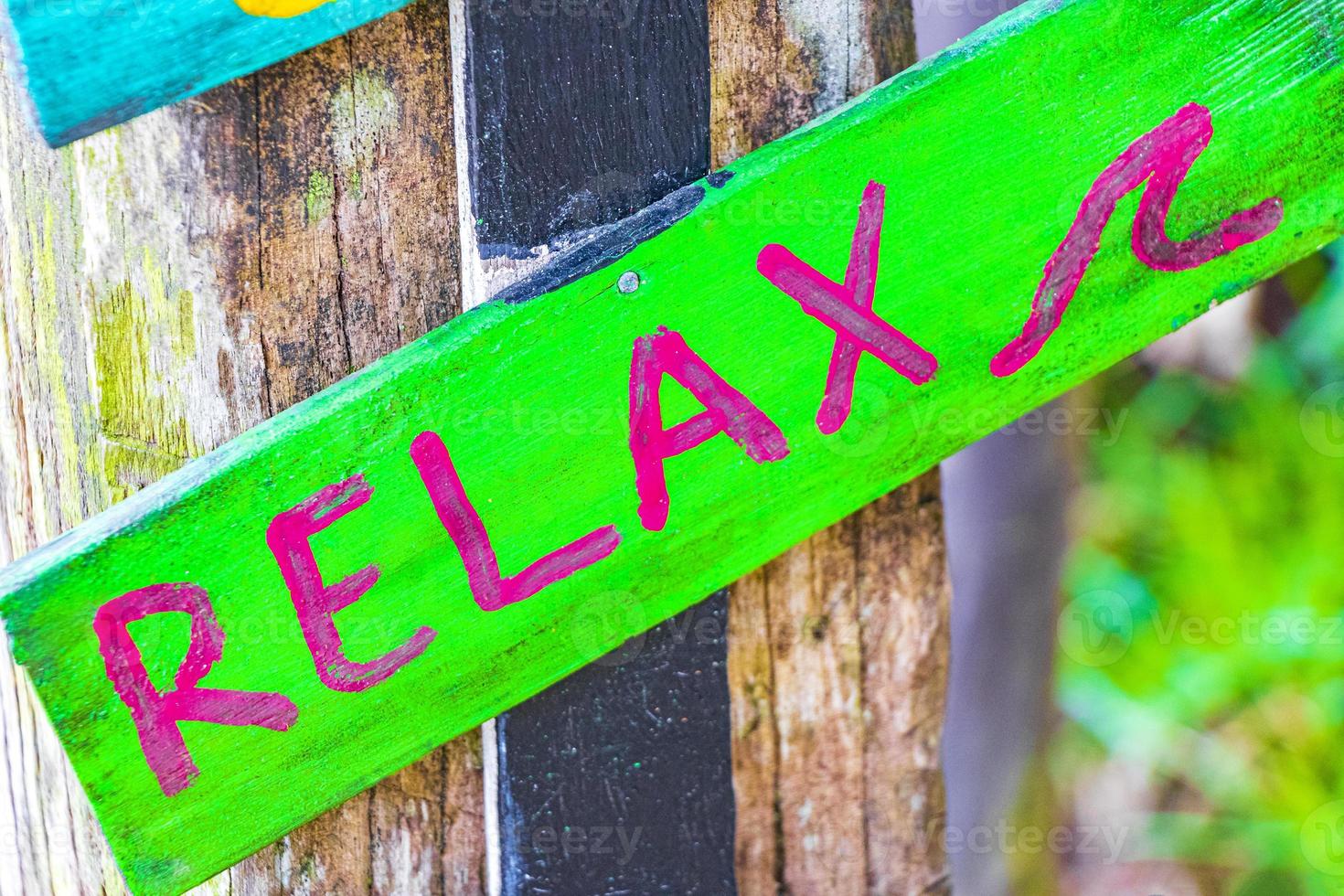 Relax on colorful green directional arrows on Ilha Grande Brazil. photo