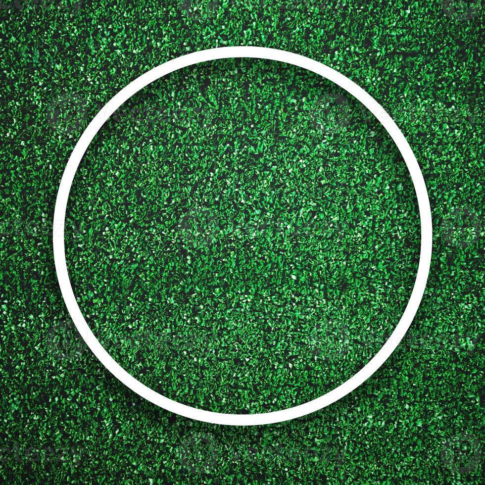 Circular white frame edge on green grass with shadow background photo