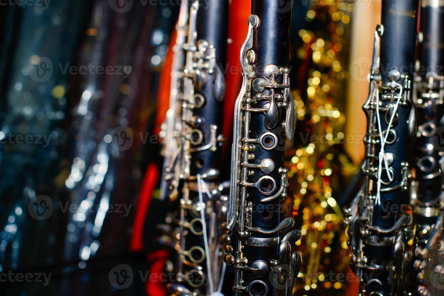 Clarinets in a shop window of musical instruments photo