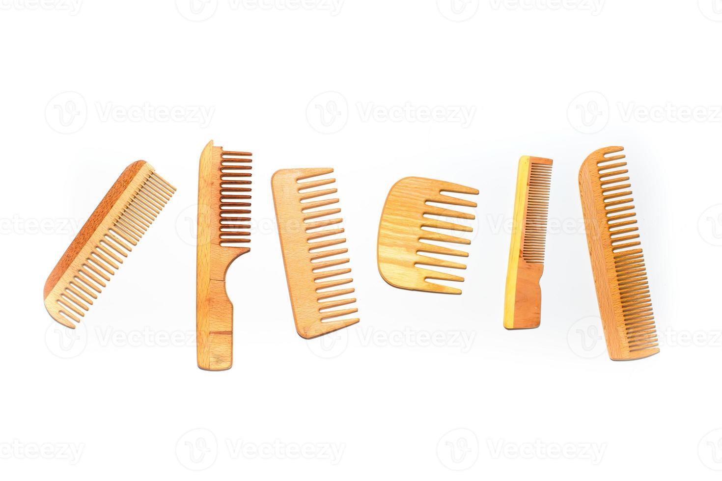 Set of wooden comb on a white background photo