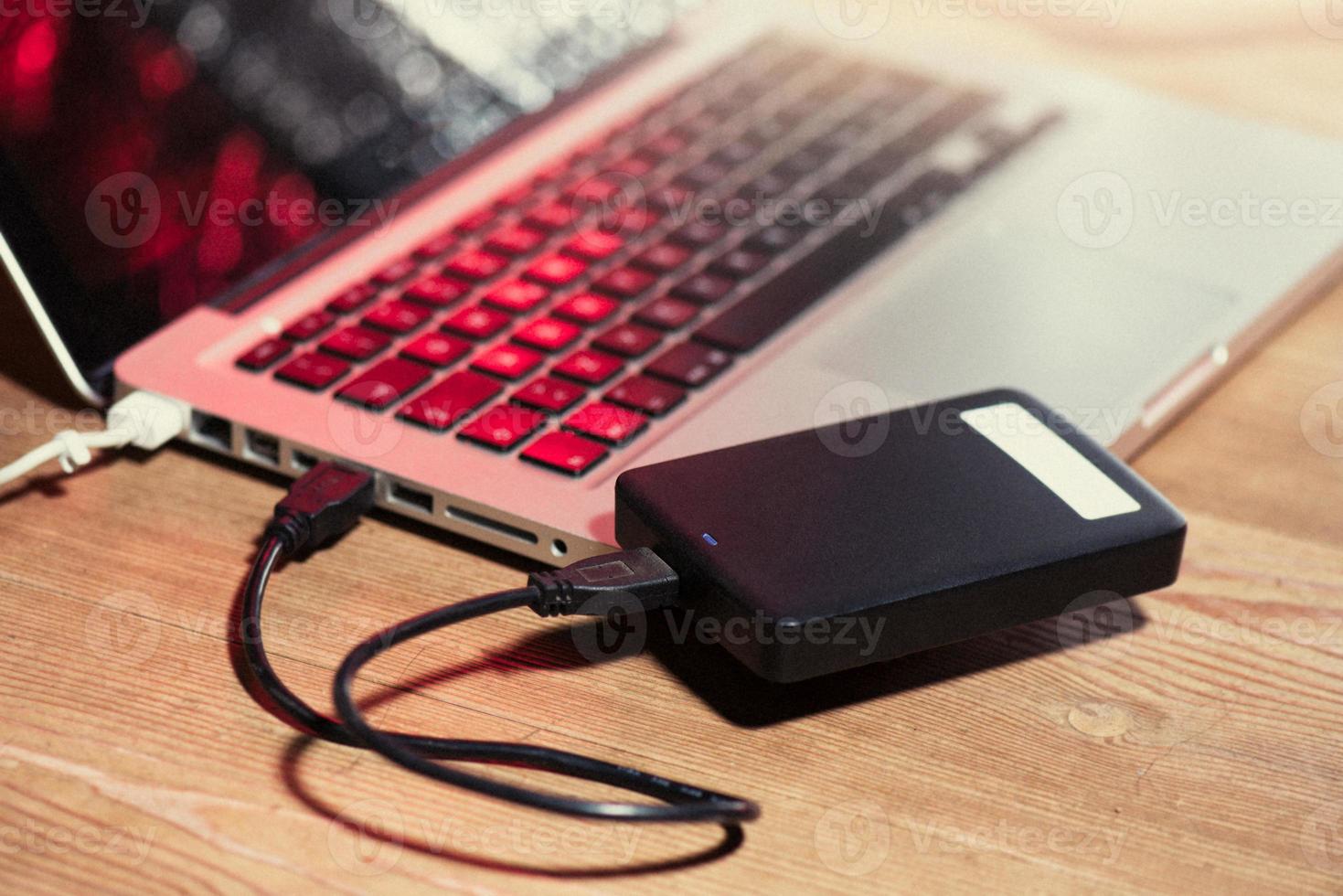 External Hard Drive Connected to Laptop 3413625 Stock Photo at Vecteezy