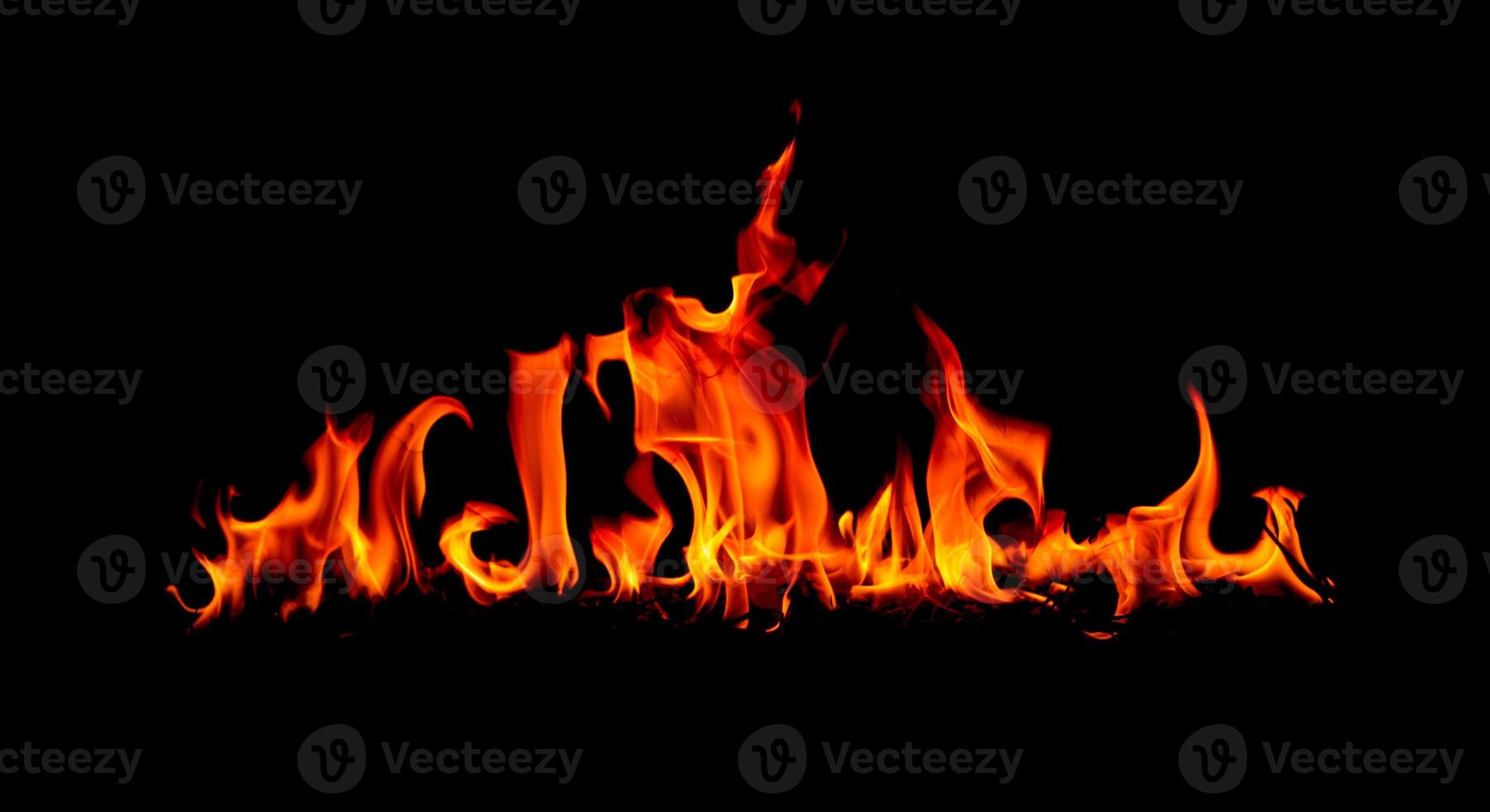 Fire flame on blackground photo