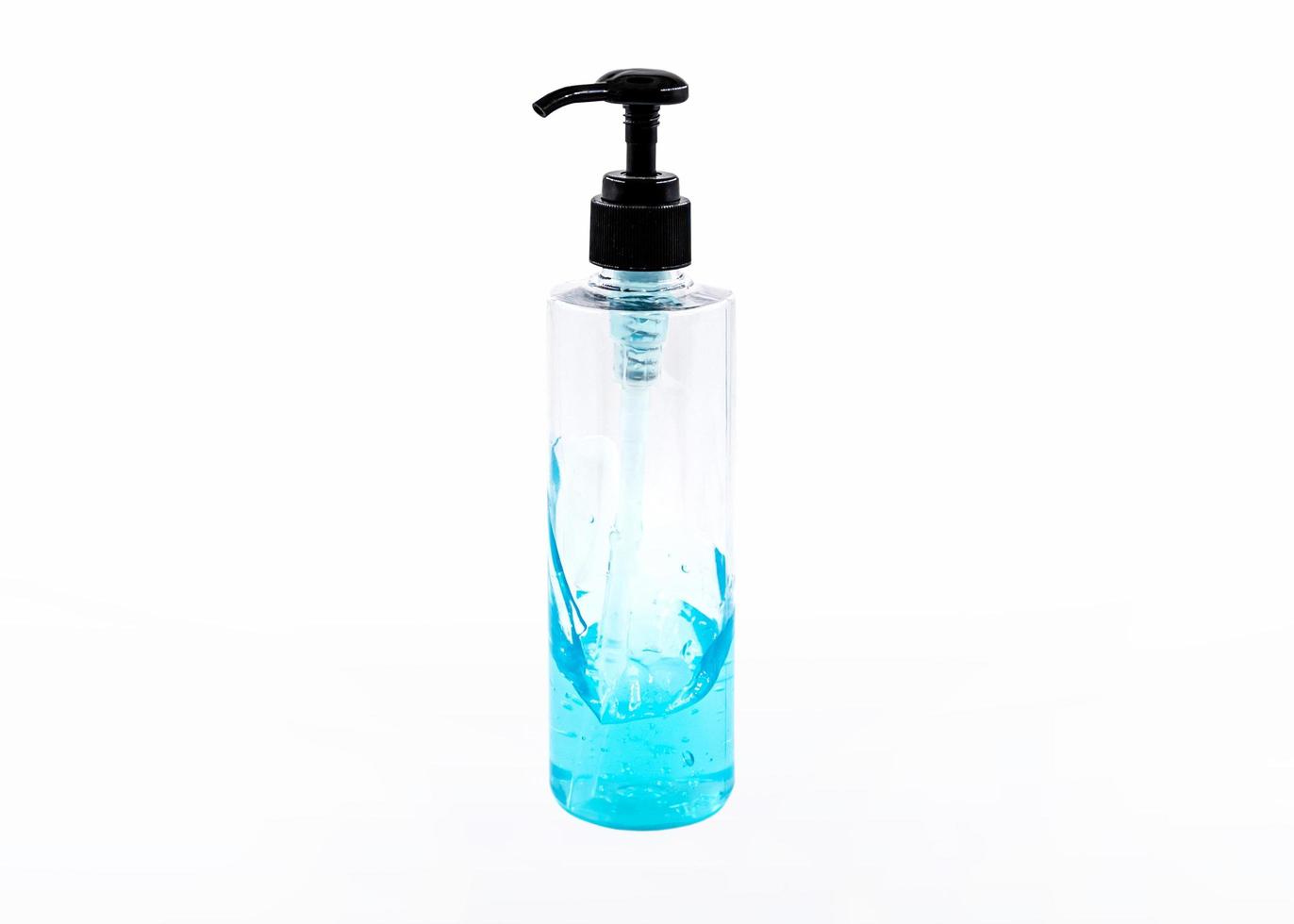 Blue alcohol sanitizer gel bottle with pump for hand wash photo