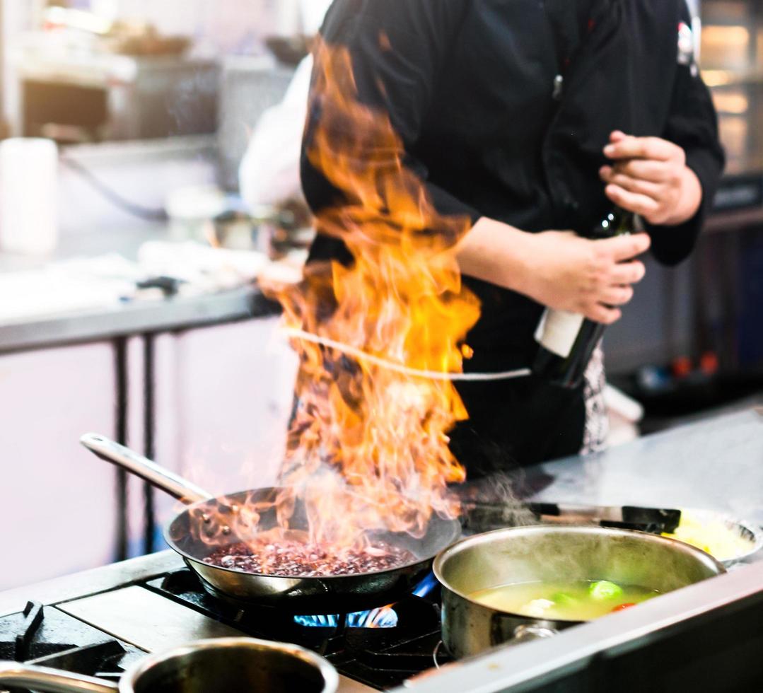 Chef cooking, Chef preparing food in the kitchen photo