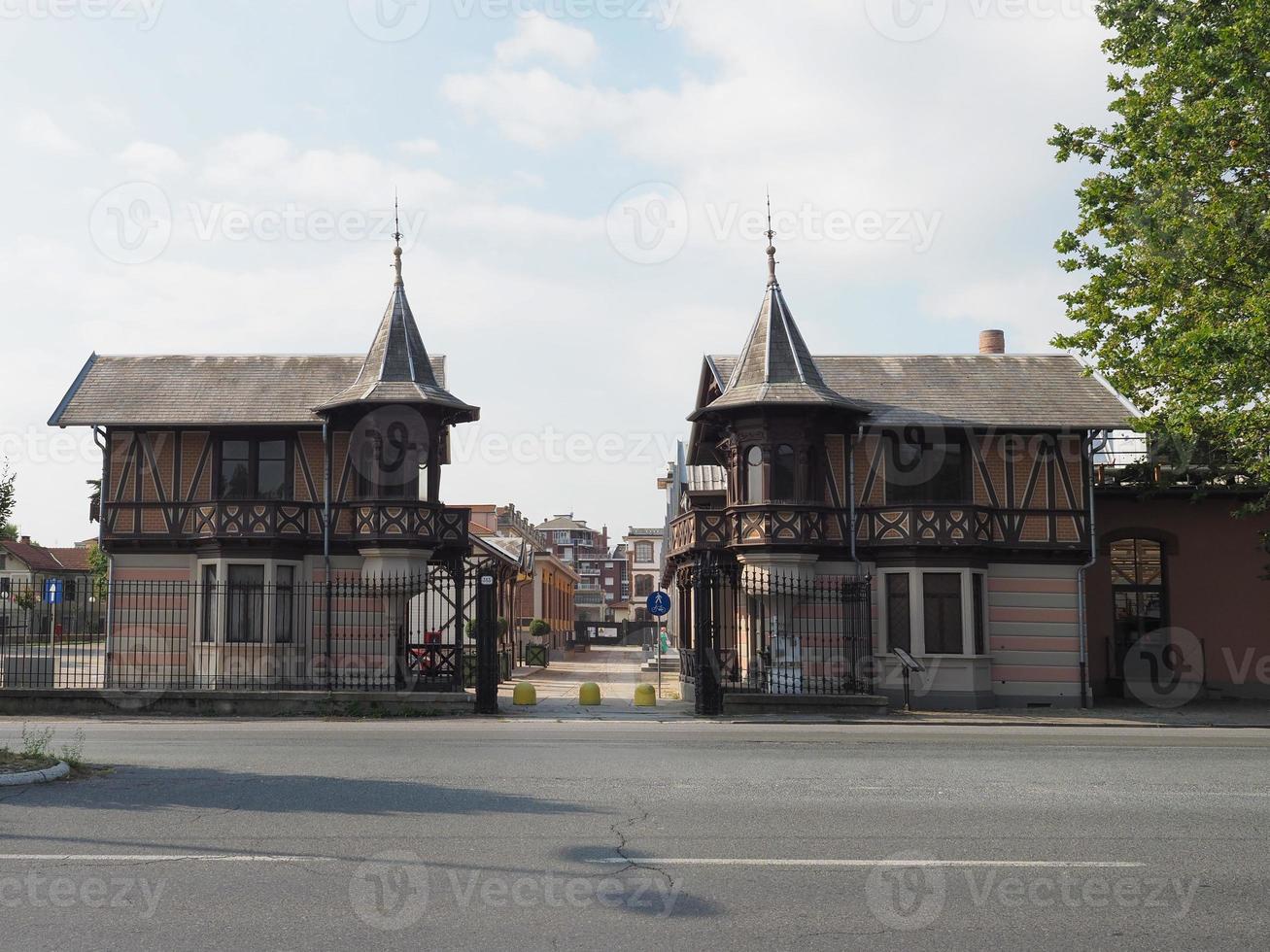 Cotton mill factory entrance at Leumann workers village in Collegno, Italy photo