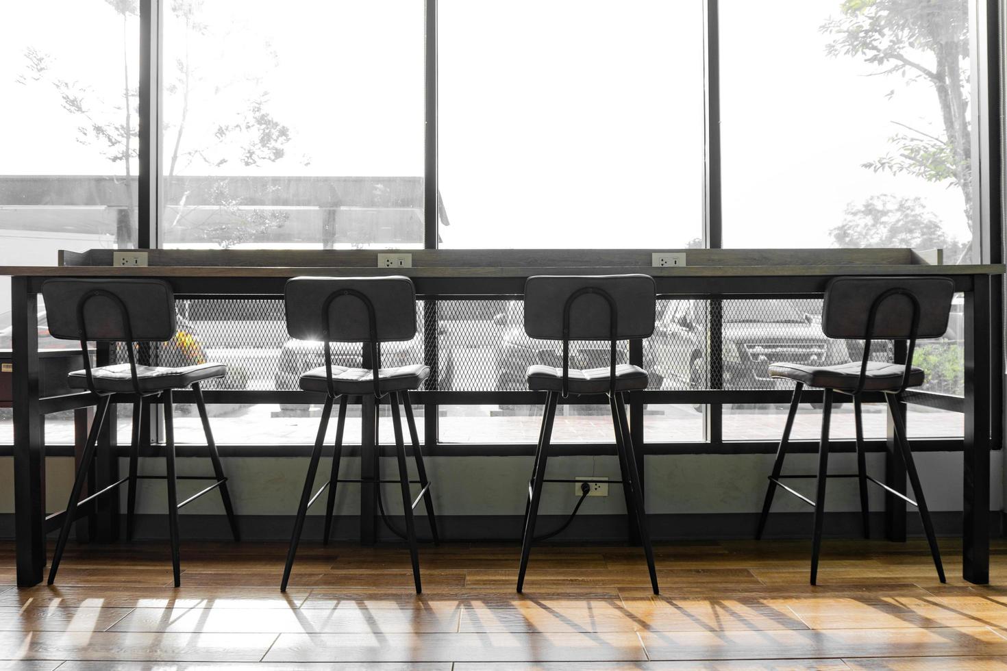 Chair silhouette in coffee shop photo