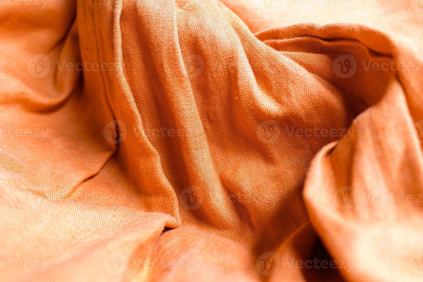 Orange linen fabric texture background photo