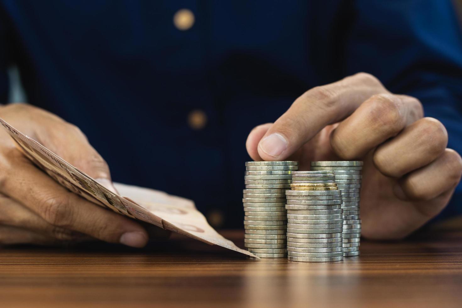 Hand counting money coins stack business finance photo