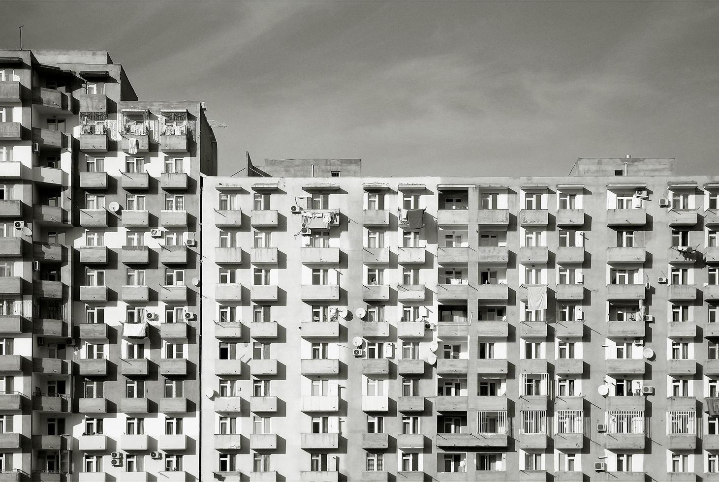 Modern multistory building in back and white photo