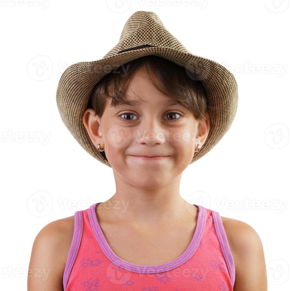 Smiling little girl in straw hat photo