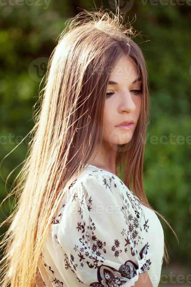 Beautiful long-haired girl photo