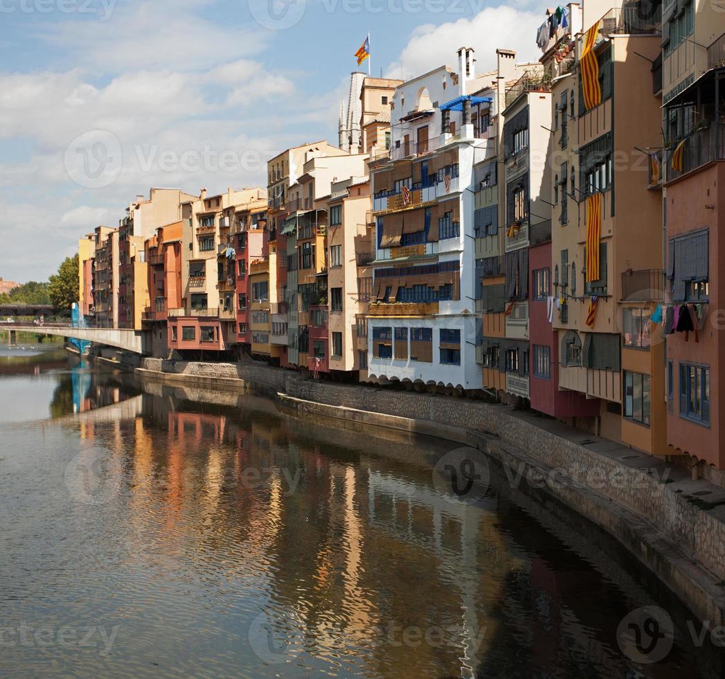 Multi-colored houses on the banks of the river photo