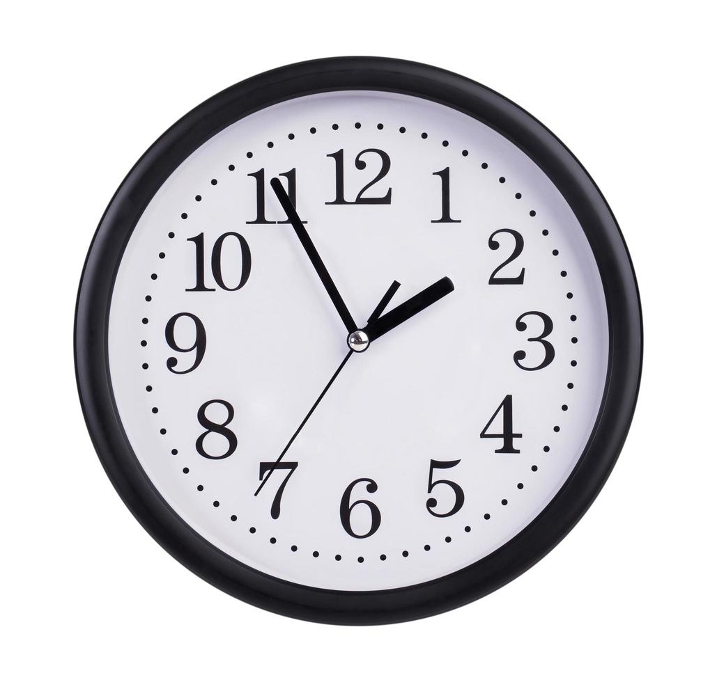 Office clock shows five minutes to two photo