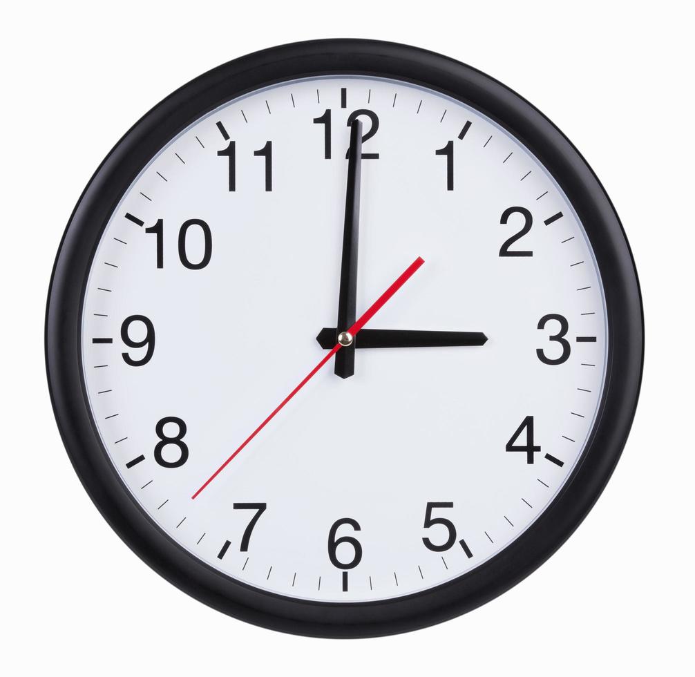 Round clock is exactly three hours photo