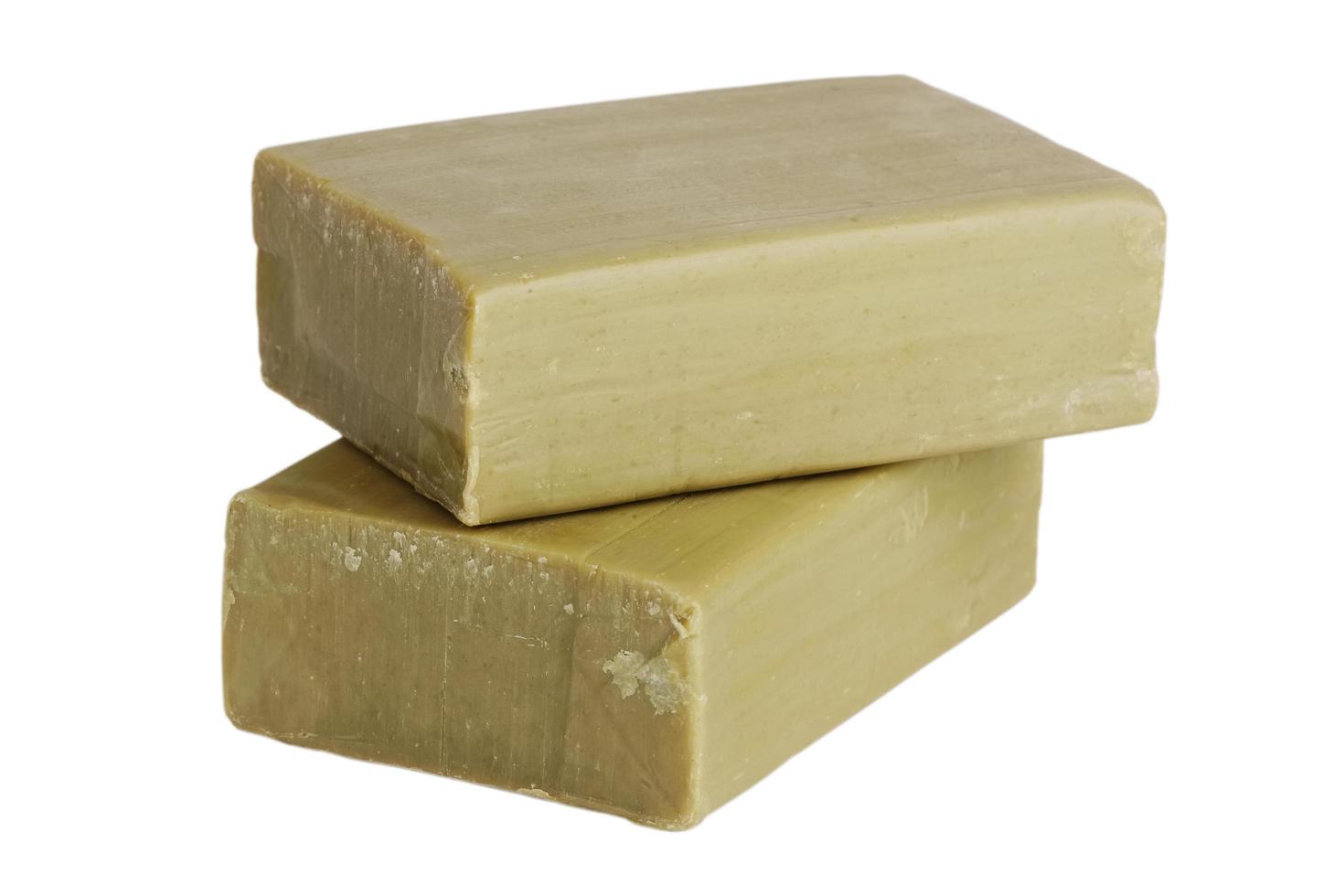 Two pieces of olive green soap photo