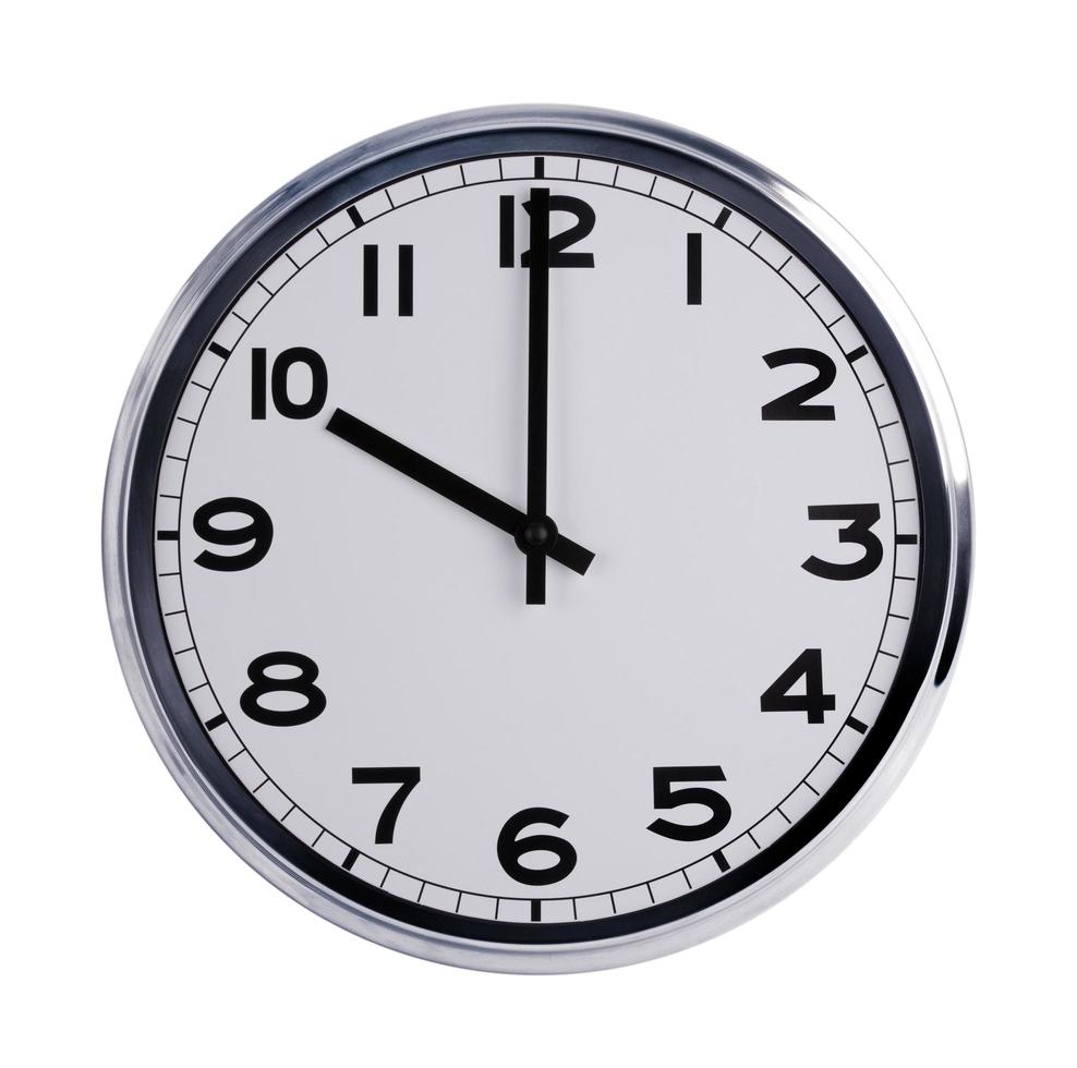 Round office clock shows ten o'clock photo