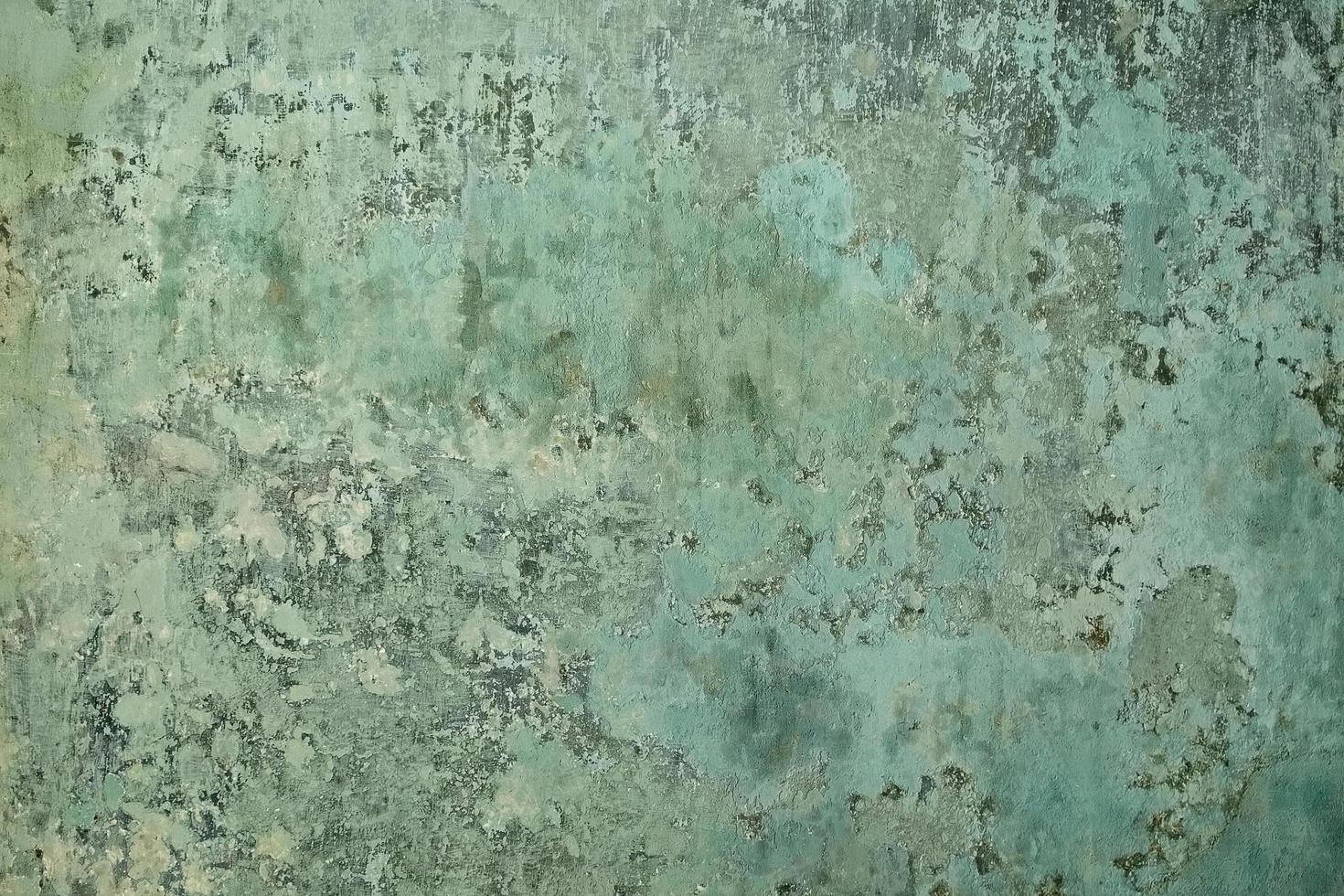 Old plastered surface of green color photo