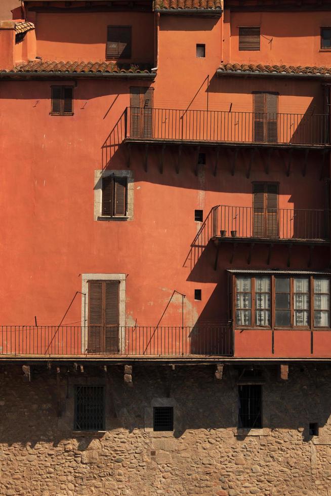 Red facade of the old houses photo