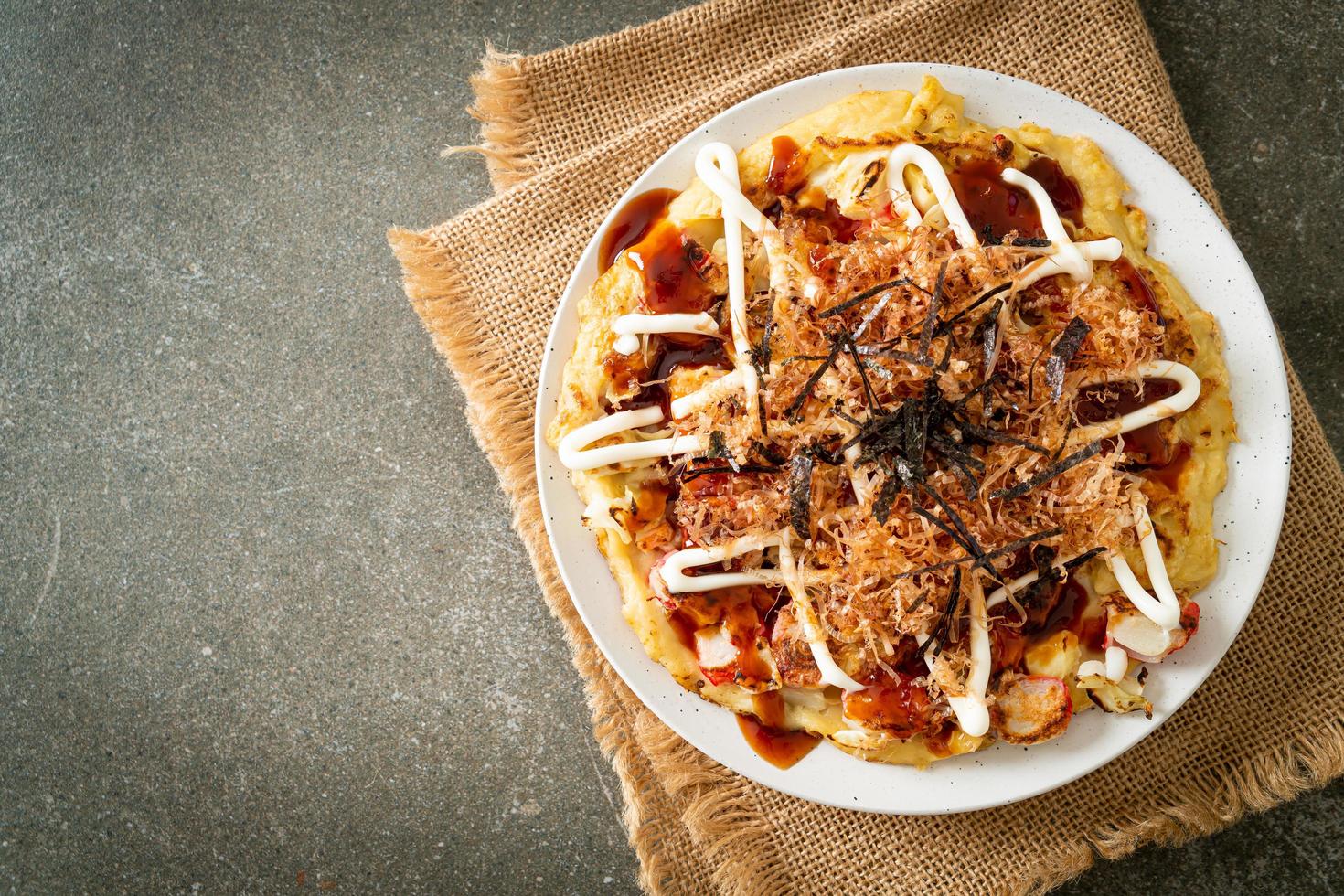 Japanese Traditional Pizza that called Okonomiyaki photo