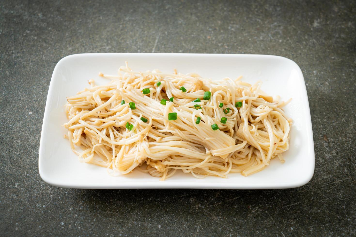 Stir-fried golden needle mushroom with butter photo