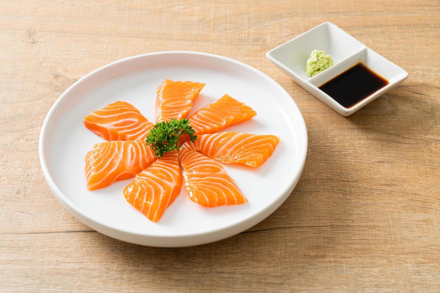 Fresh Salmon Raw Sashimi on plate photo