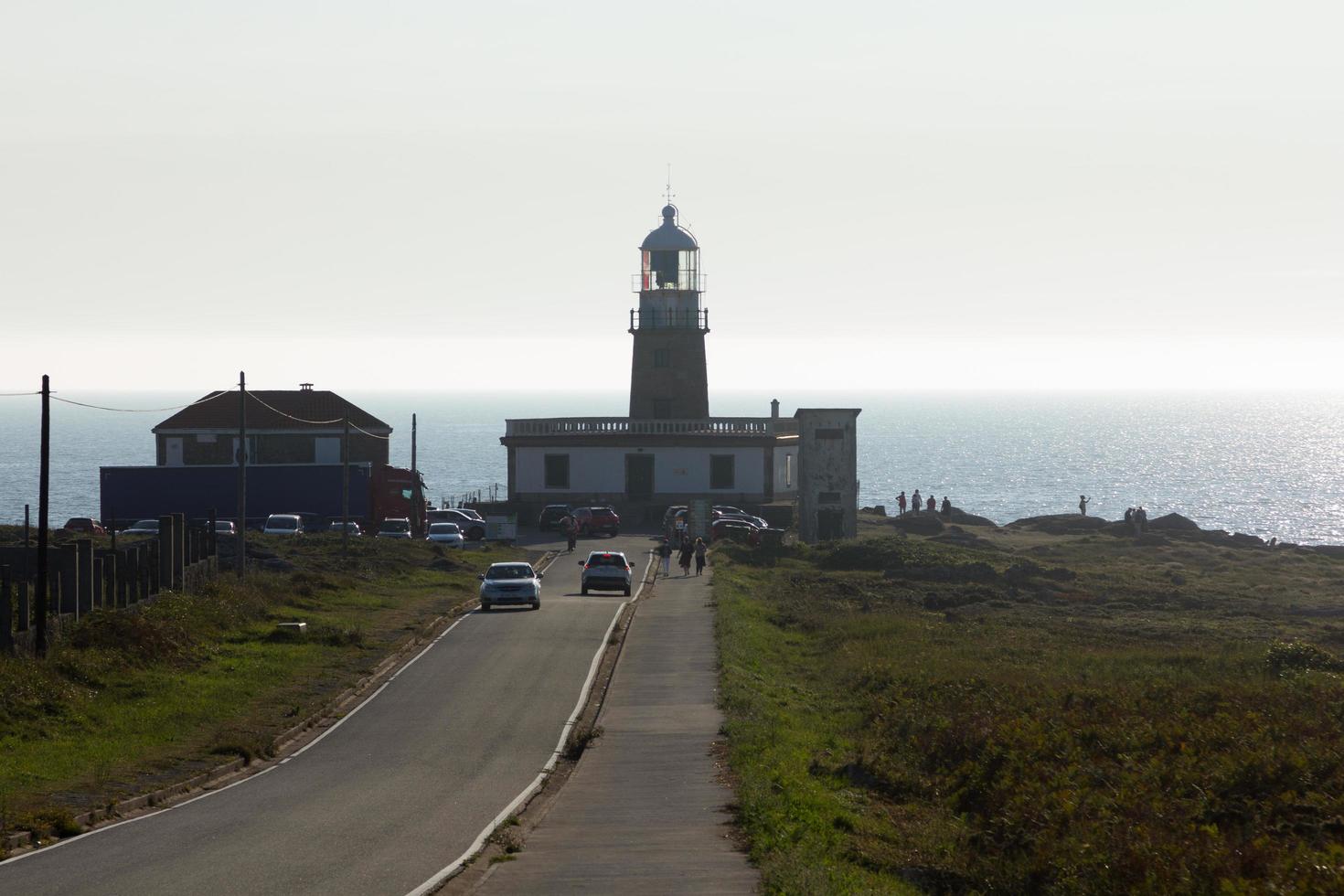 Corrubedo lighthouse in the Atlantic Ocean, Galicia, spain photo