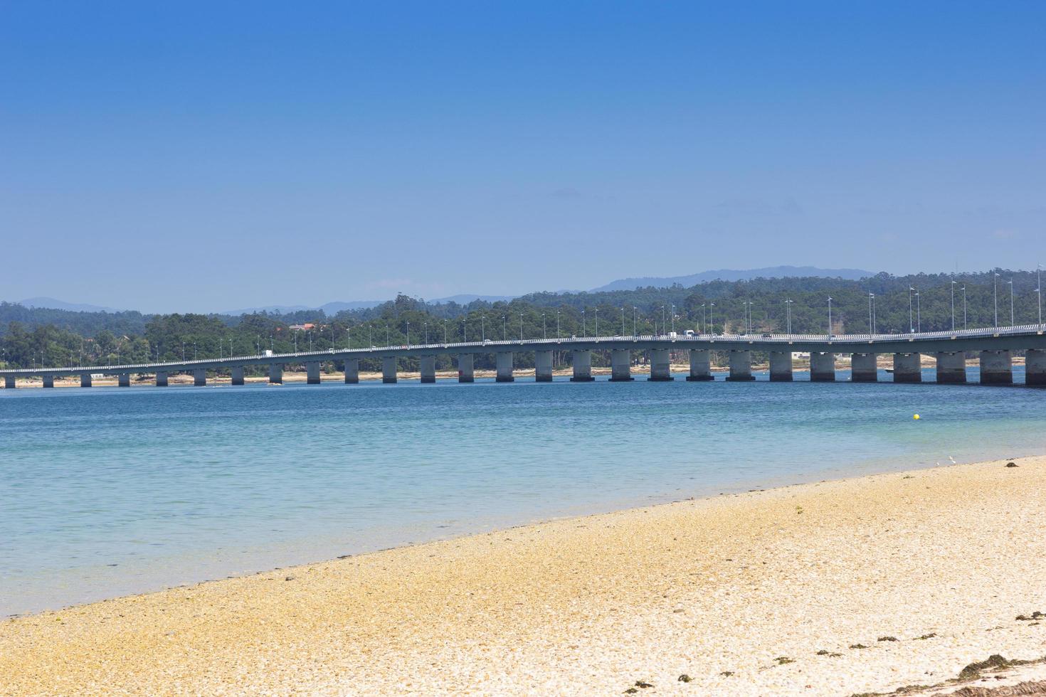 Long bridge linking an island to the mainland photo