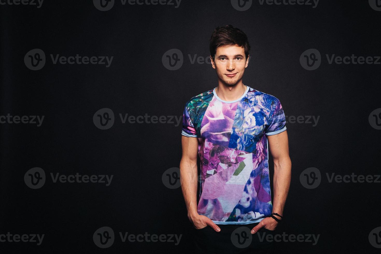 man sports appearance dressed in shirt on a black background photo