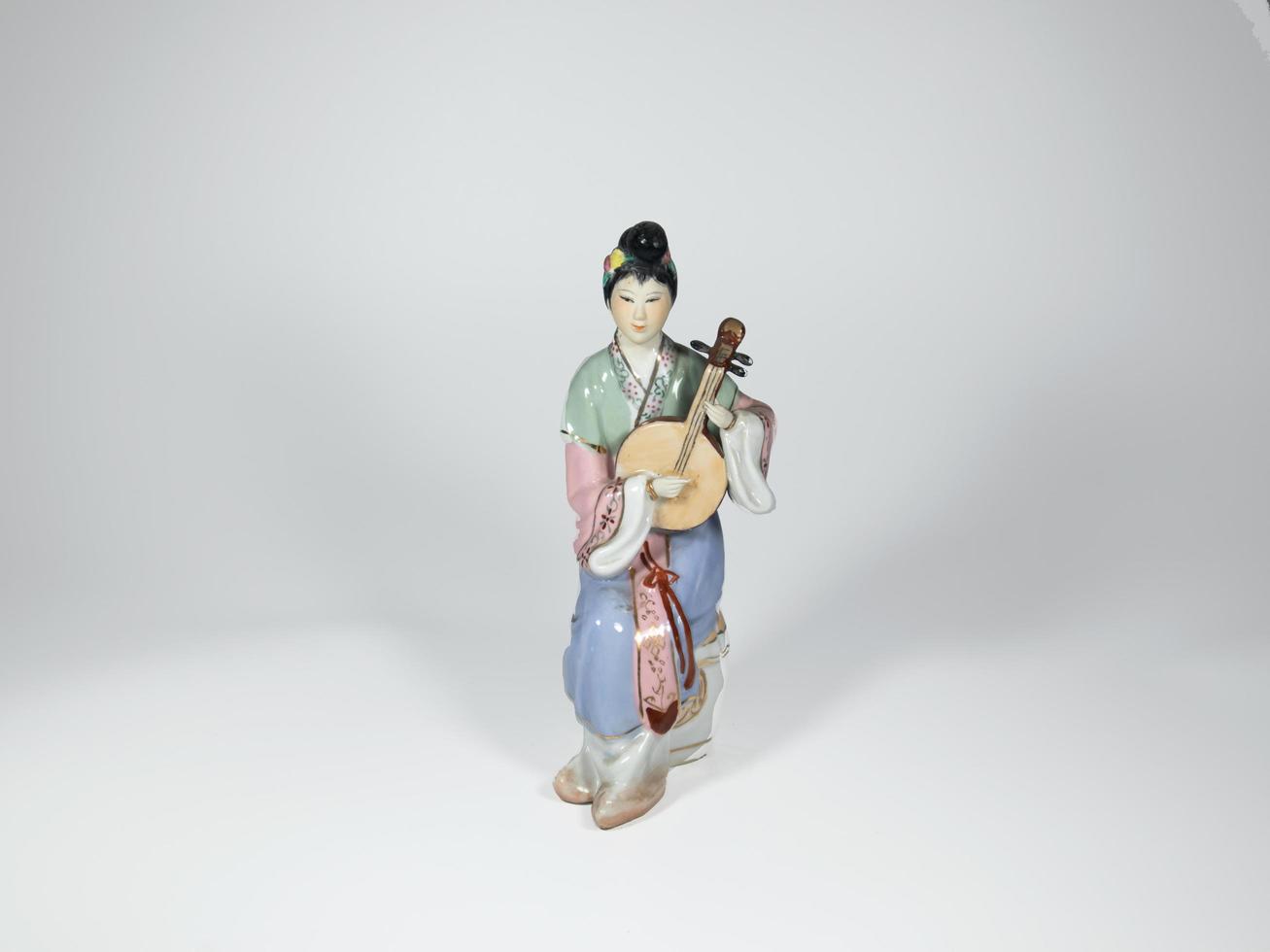 Eight Immortals ceramic stand, shoot on the white stage photo