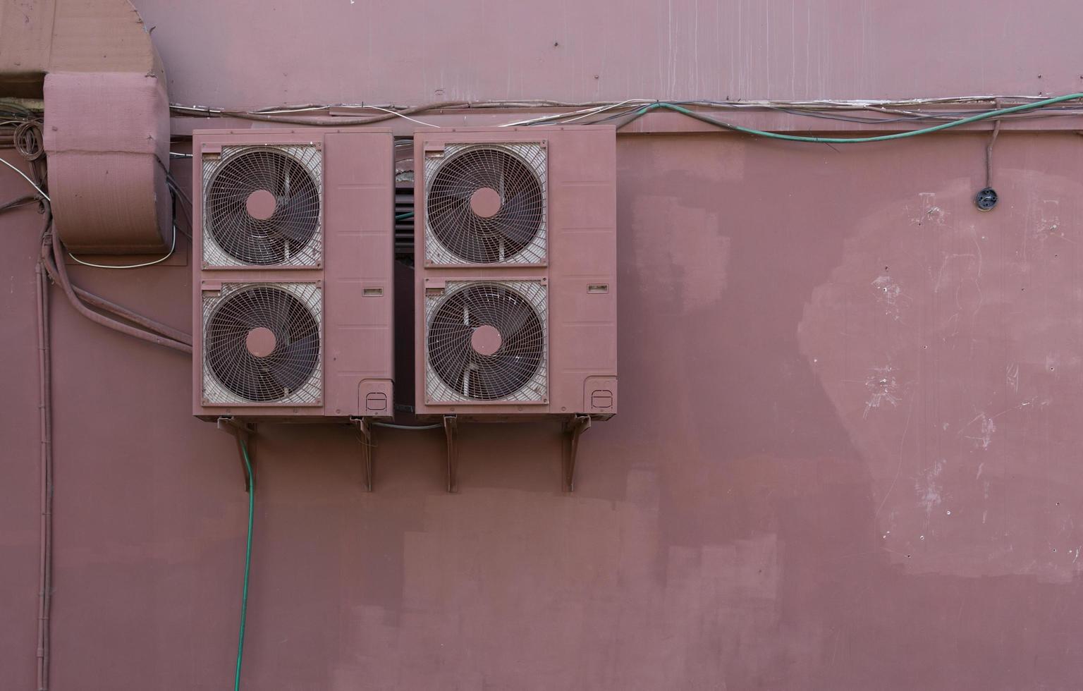 City background with painted wall and air conditioning. photo