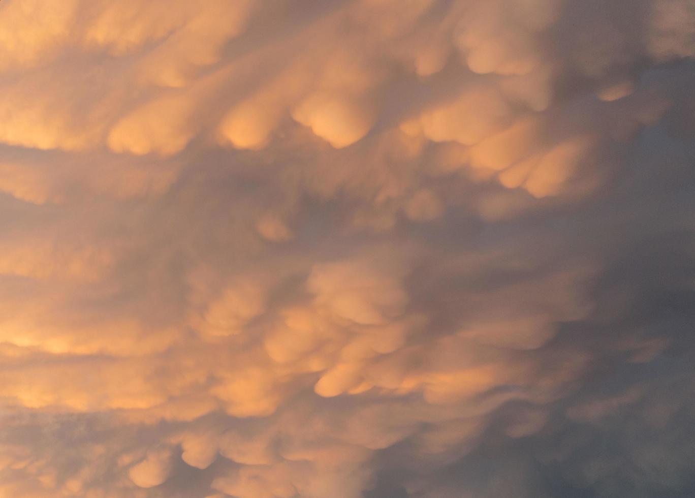 Natural sky background with mammatus clouds. photo